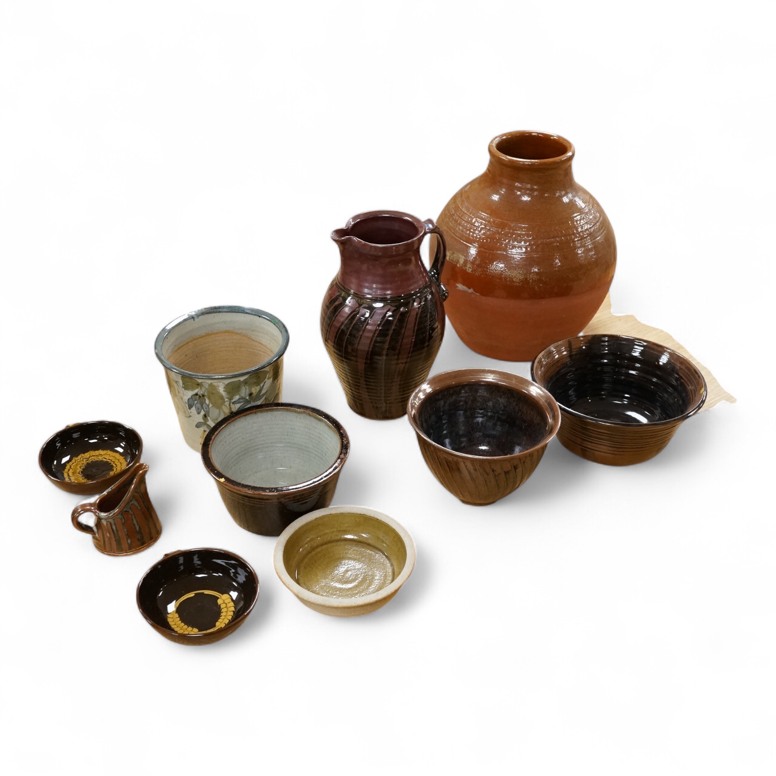 Muchelney and other studio pottery to include pots, a large vase and jug, largest 37cm high (10)